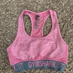 Pink gymshark flex sports bra with gray band